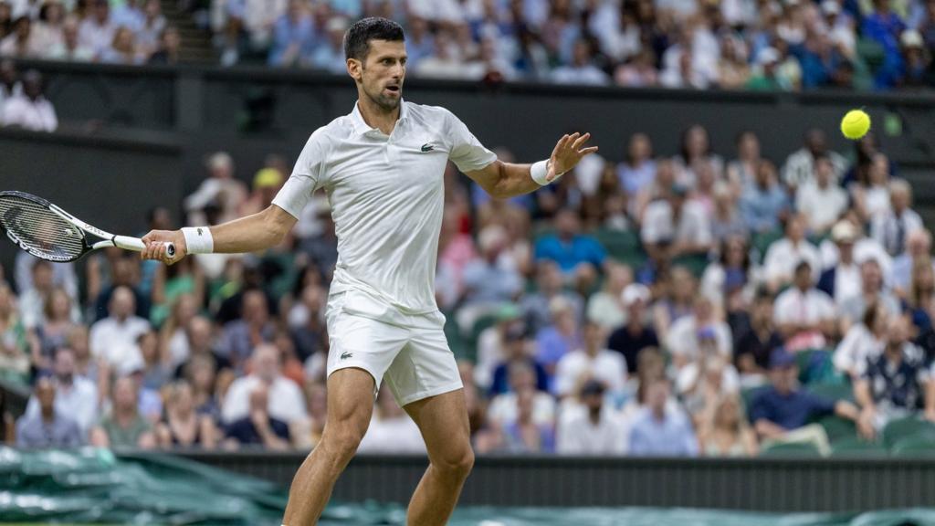 Novak Djokovic plays a forehand