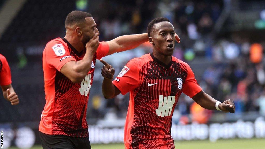 Birmingham's Siriki Dembele celebrates his debut goal with another summer signing, Keshi Anderson