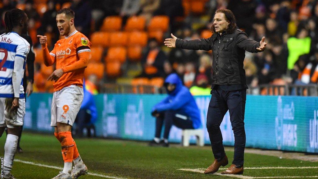 Gareth Ainsworth (right) managing Queens Park Rangers at Blackpool