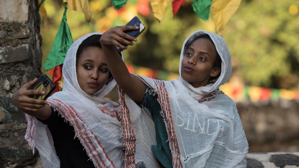 Ethiopian women taking selfies