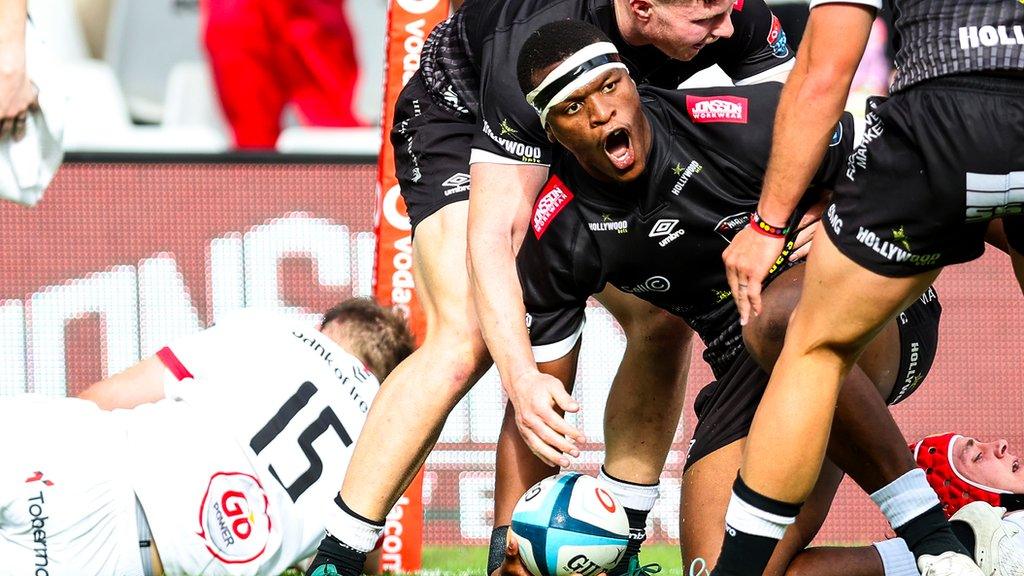 Phepsi Buthelezi celebrates after scoring a try