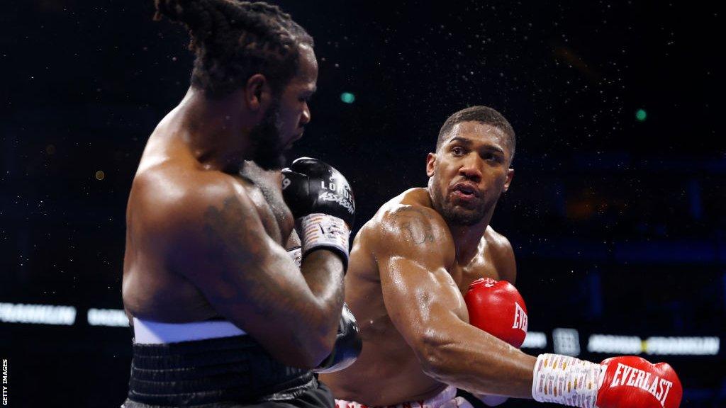 Anthony Joshua punches Jermaine Franklin