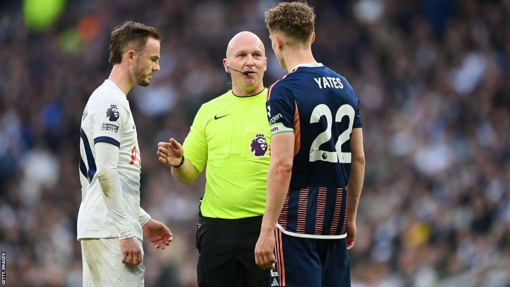 Referee Simon Hooper speaks to James Maddison and Ryan Yates