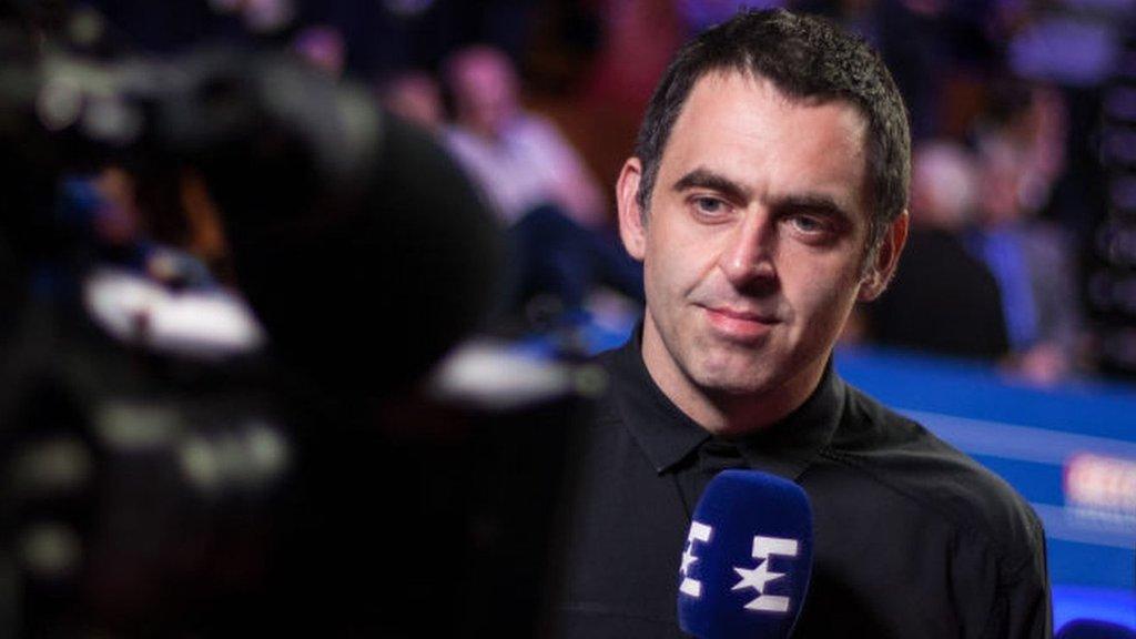 Ronnie O'Sullivan with microphone