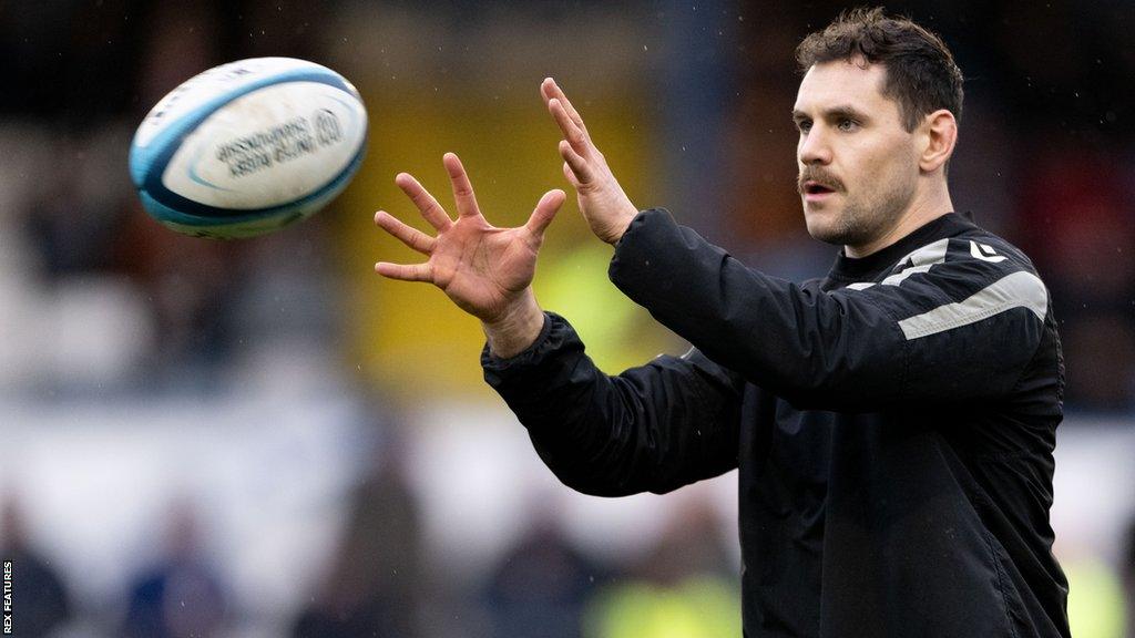 Tomos Williams catches a ball in a pre-match warm-up