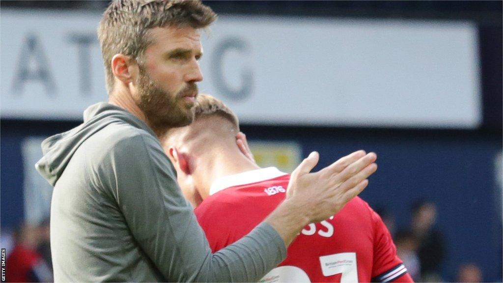 Michael Carrick claps his players off and applauds the fans at West Brom