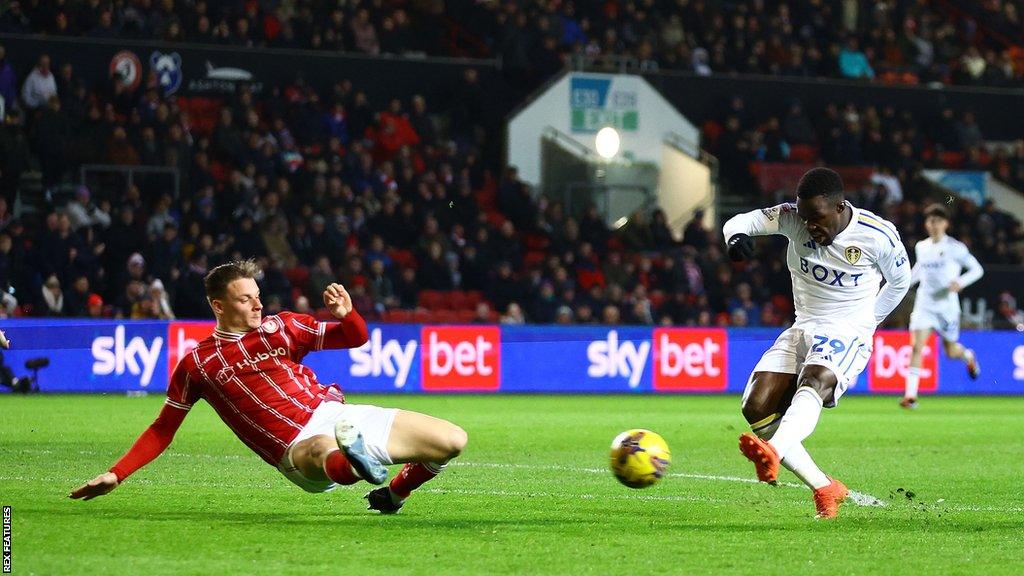 Wilfried Gnonto strikes the ball to score for Leeds