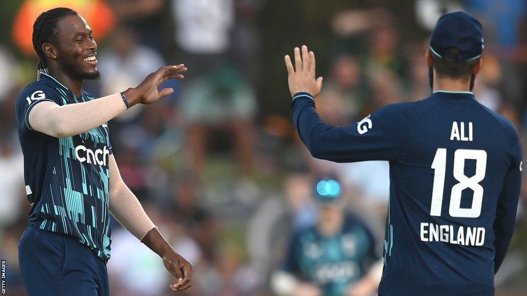 England bowler Jofra Archer celebrates with Moeen Ali after taking a wicket against South Africa in the third one-day international in Kimberley