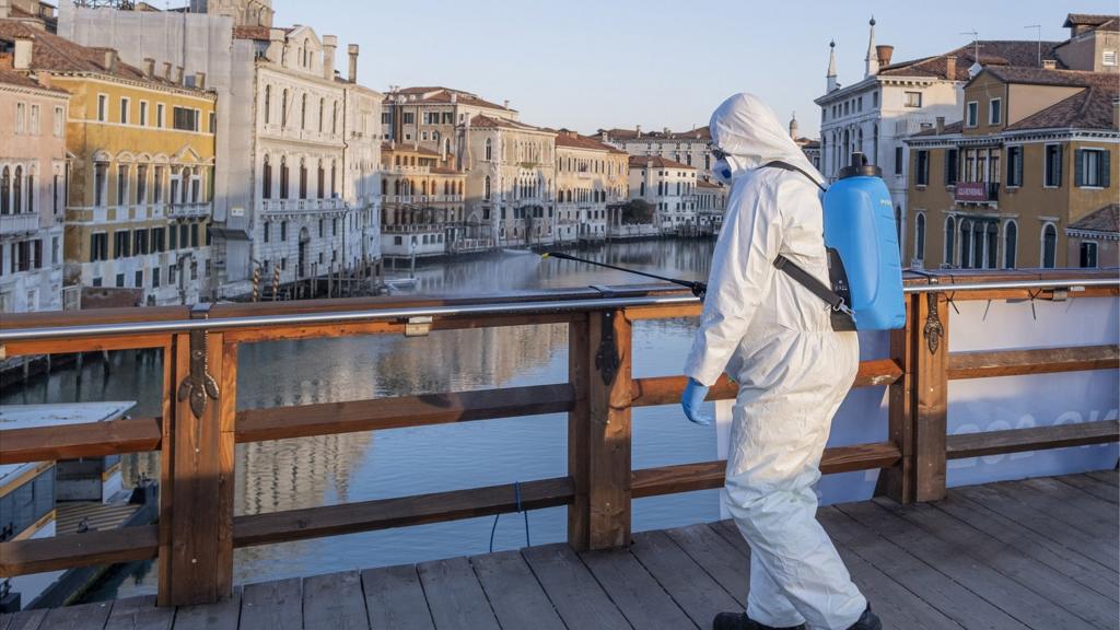 Ecological operator sanitizes Accademia Bridge on March 24, 2020 in Venice, Italy. The Italian government continues to enforce the nationwide lockdown measures to control the spread of COVID-19