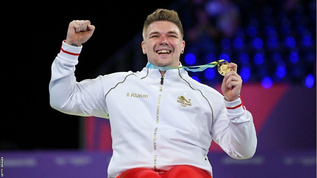 Gold medallist Jack Hunter-Spivey of Team England celebrates during the Men's Singles Classes 3-5