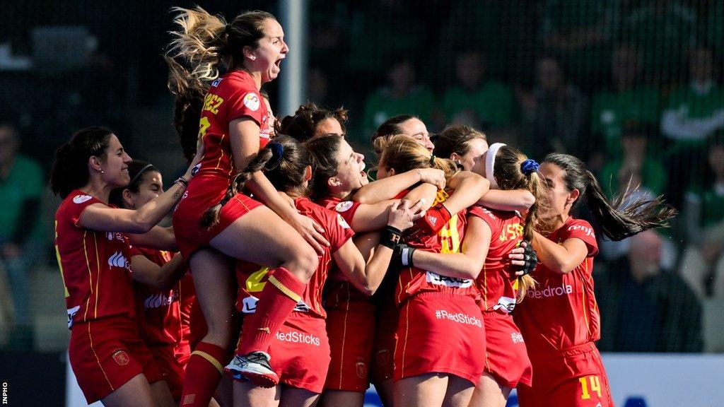 Spain celebrate their victory over Ireland