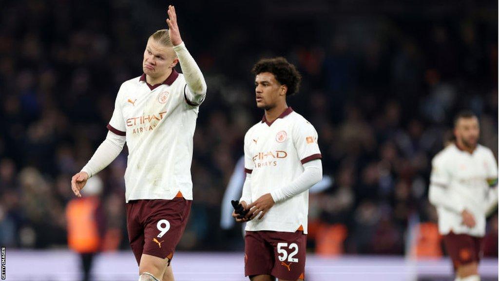 Erling Haaland looks dejected after defeat