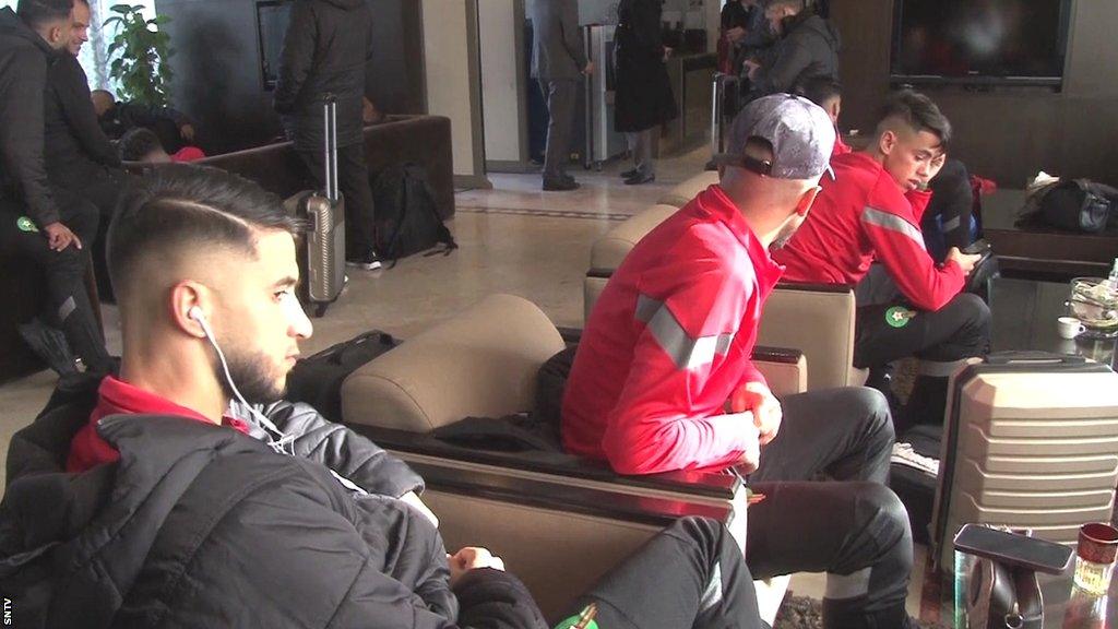 Morocco players wait at Rabat Airport