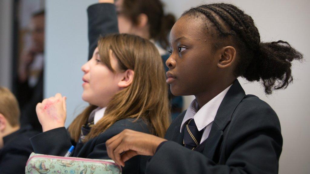 School girls return to school