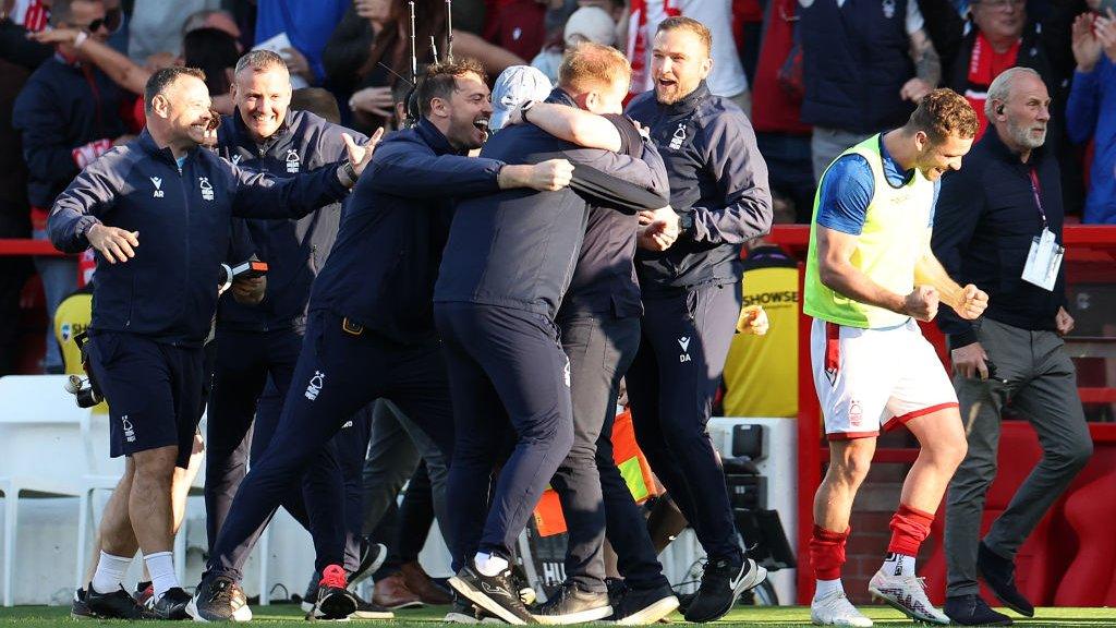 Nottingham Forest manager Steve Cooper celebrates with his backroom staff after guiding his side to Premier League safety