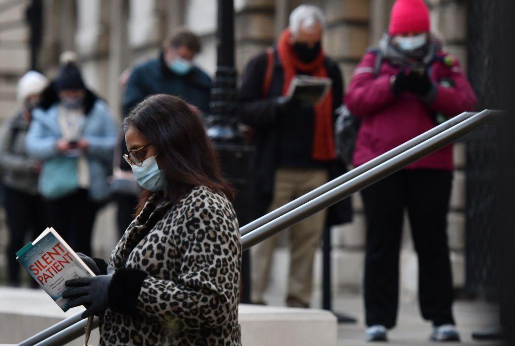 People queueing for vaccination i n London