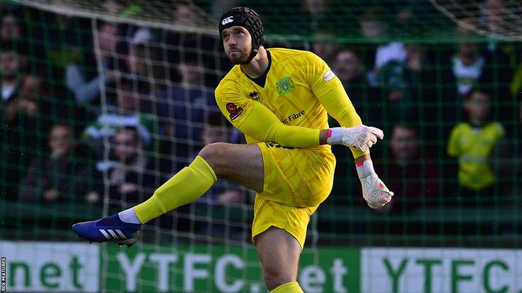 Joe Day kicks the ball during Yeovil's FA Cup match against Gateshead