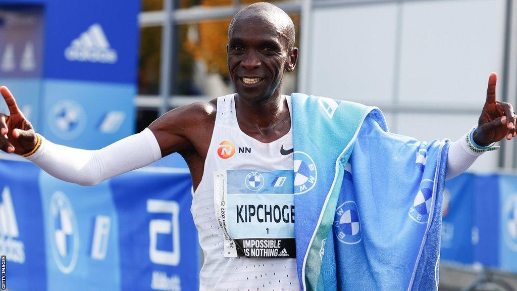 Eliud Kipchoge celebrates setting a new world record at the Berlin Marathon