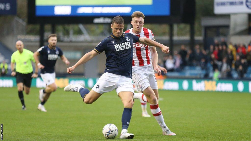 Matt Smith shoots for Millwall against Stoke City