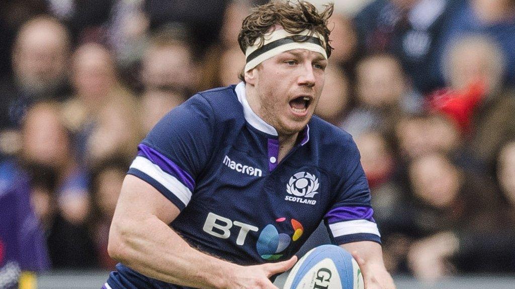 Hamish Watson in action for Scotland