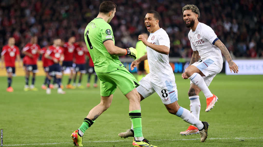 Aston Villa players celebrate after beating Lille in the Europa Conference League