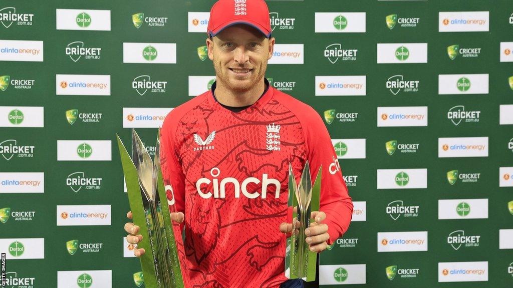 England captain Jos Buttler with the T20 series trophy and player of the series trophy