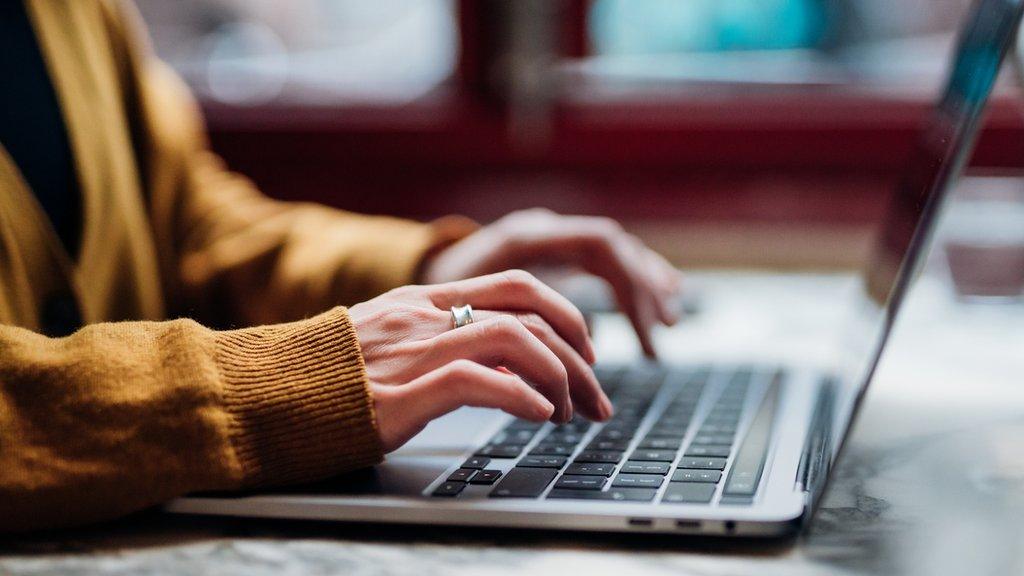 Woman using laptop