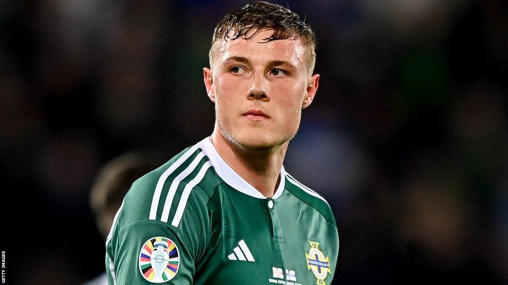 Dan Ballard looks towards the crowd during a Northern Ireland match