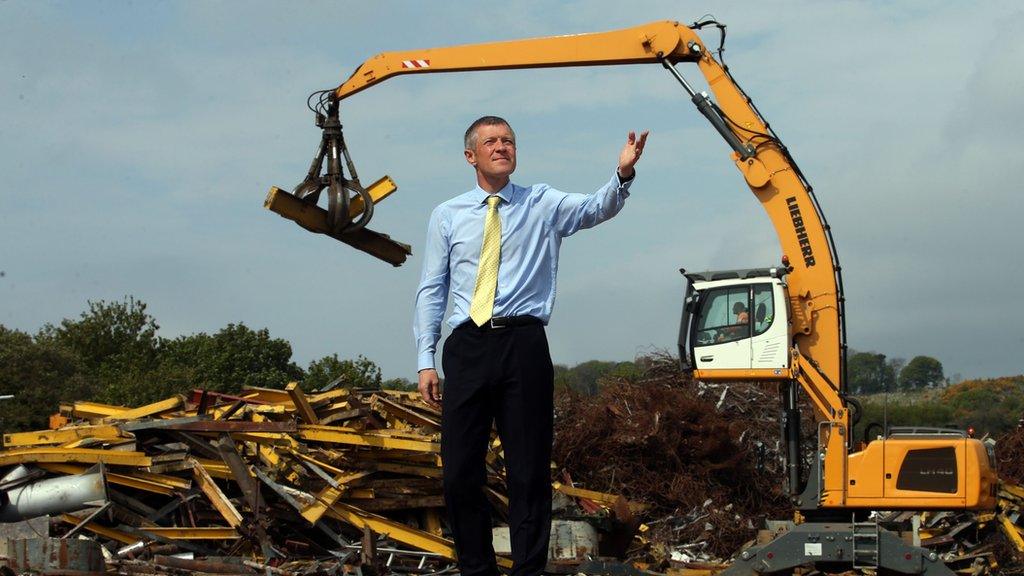 Willie Rennie at a scrapyard.