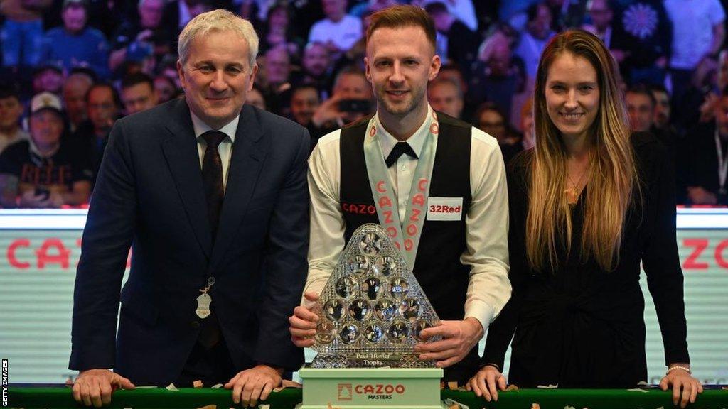 World Snooker Tour chairman Steve Dawson (left) presented Judd Trump with the Masters trophy at this year's tournament