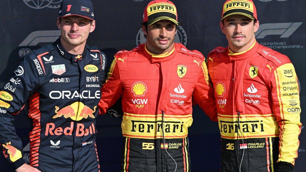 Max Verstappen, Carlos Sainz and Charles Leclerc pose for photographs after marking up the top three in Italian Grand Prix qualifying