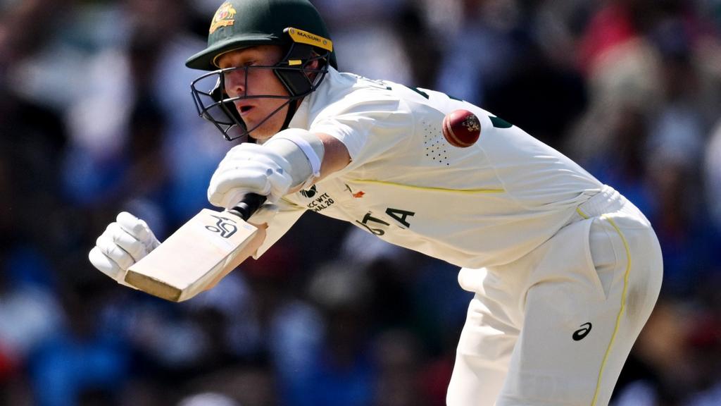 Australia batter Marnus Labuschagne reacts after being hit on the hand