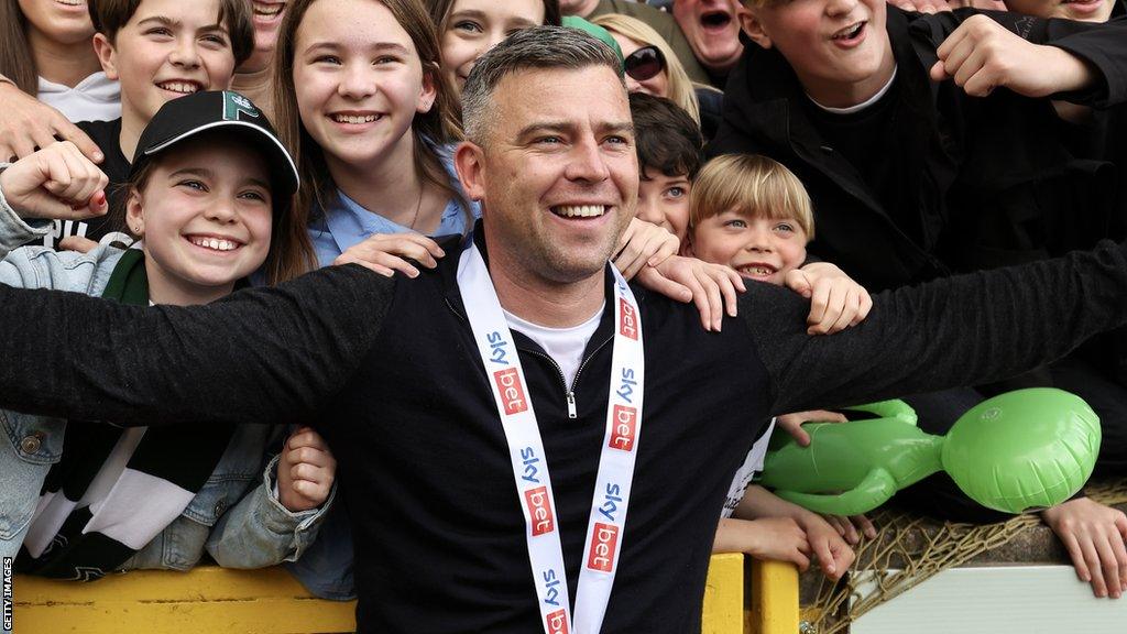 Steven Schumacher celebrates leading Plymouth Argyle to the League One title last season