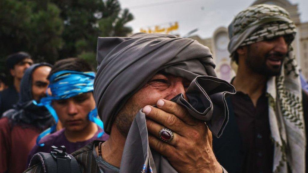 Afghans outside Kabul airport on 17 August 2021