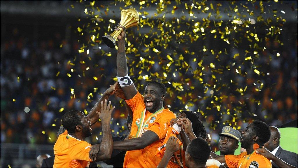 Yaya Toure lifts the trophy after captaining Ivory Coast to Africa Cup of Nations glory