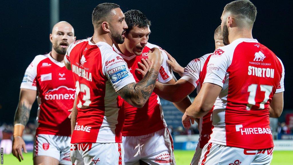 Ryan Hall celebrates his try with teammates as Rovers moved 12-2 up