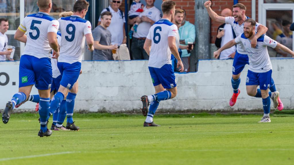 Bury AFC celebrate goal against Widnes in the FA Cup preliminary rounds