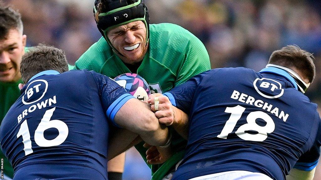 Fraser Brown and Simon Berghan make a tackle