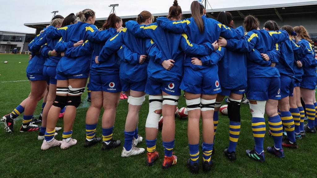 Gwalia Lightning squad huddle before kicking off