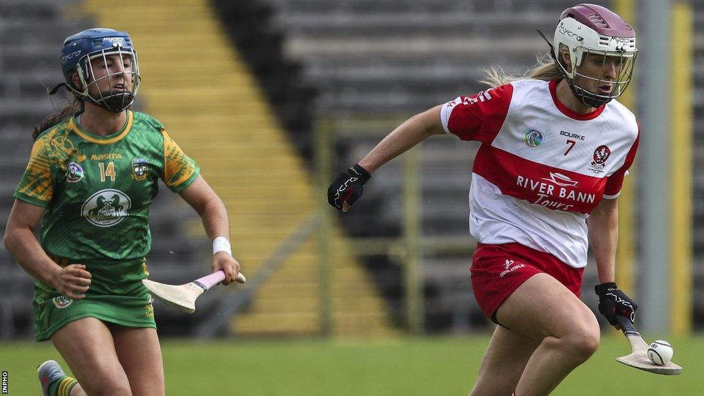 Derry's Lauren McKenna speeds away from Meath's Emma O'Connell at Clones