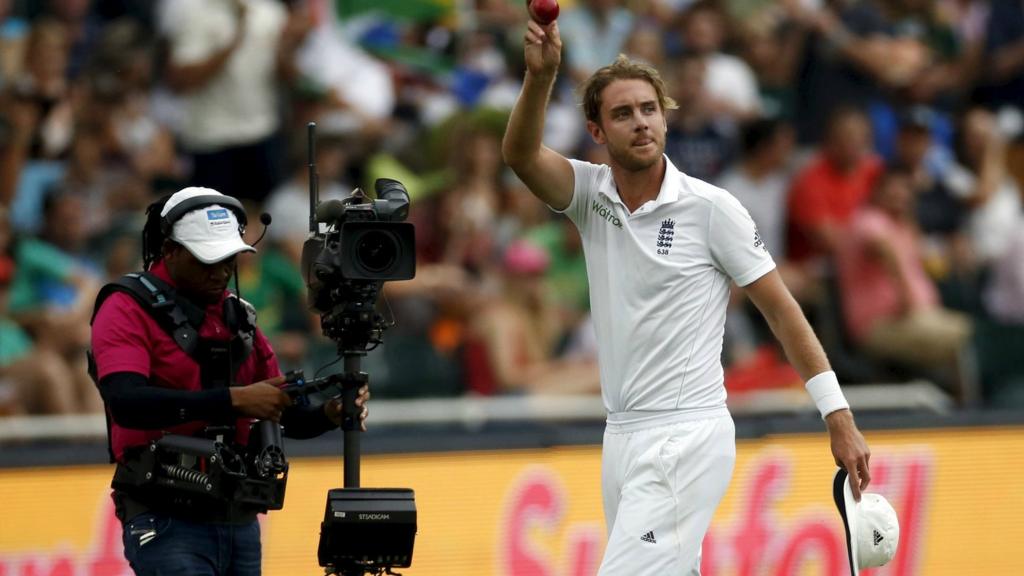 Stuart Broad holds the ball as he leaves the field