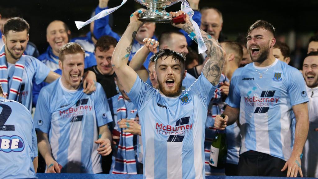 Ballymena United players celebrate with the League Cup