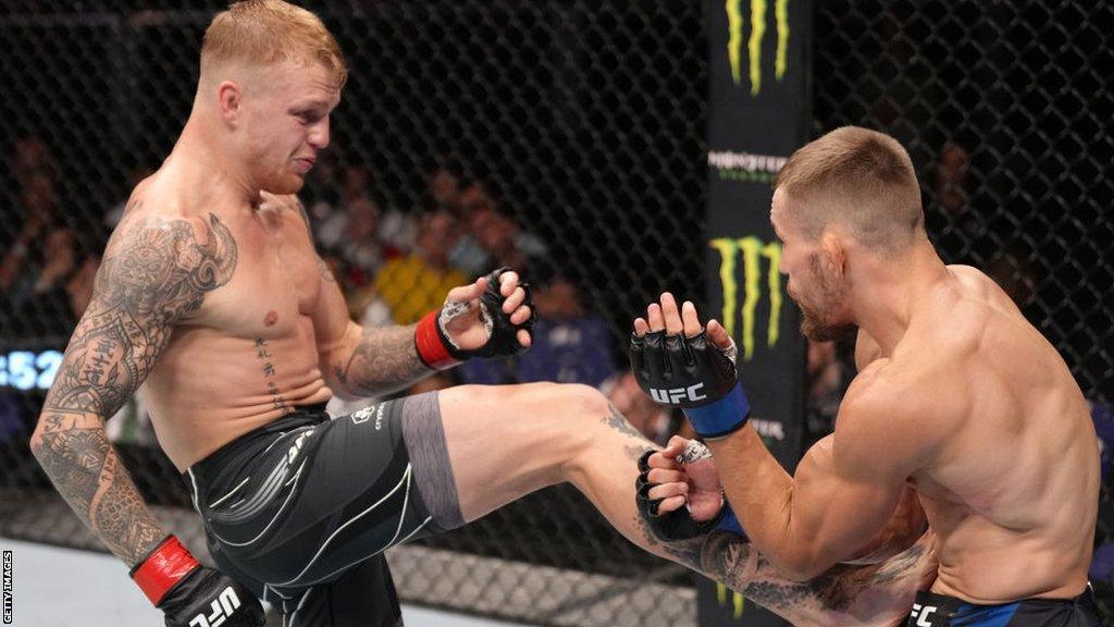 Mason Jones kicks Ludovit Klein during the UFC Fight Night event at O2 Arena in July 2022