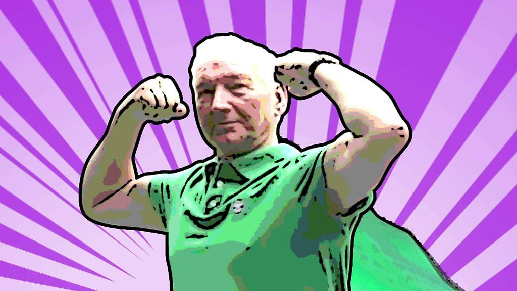 Brian, the man in charge of Wimbledon, poses like a superhero against a comic strip background