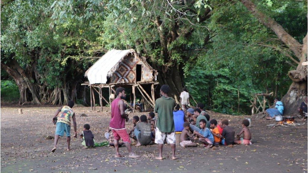 Prince Philip devotees gather after hearing about the duke's passing at age 99 yesterday, in Yaohnanen village, Tanna island, Vanuatu 10 April 2021