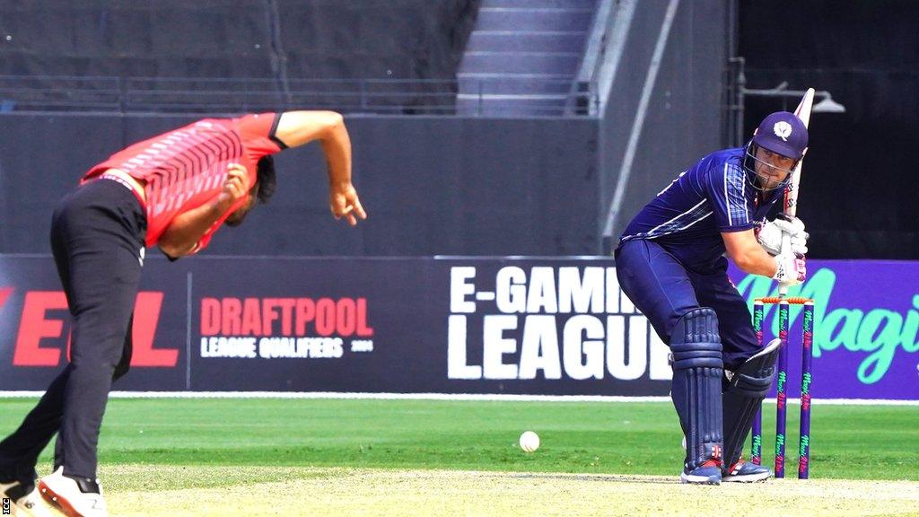 Opener George Munsey (right) in action for Scotland