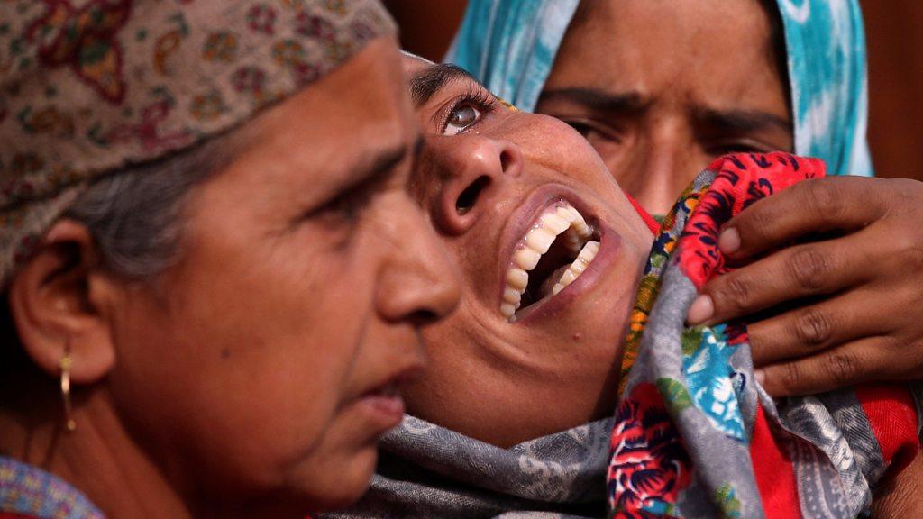 Woman consoled in Kashmir"s Pulwama district