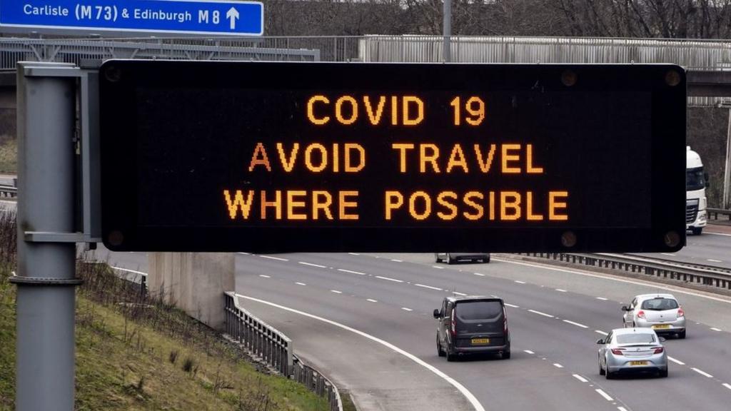 Warning on road sign