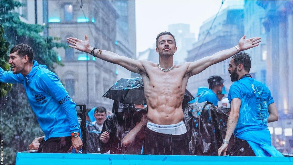 John Stones, Jack Grealish and Bernardo Silva celebrate during Treble parade