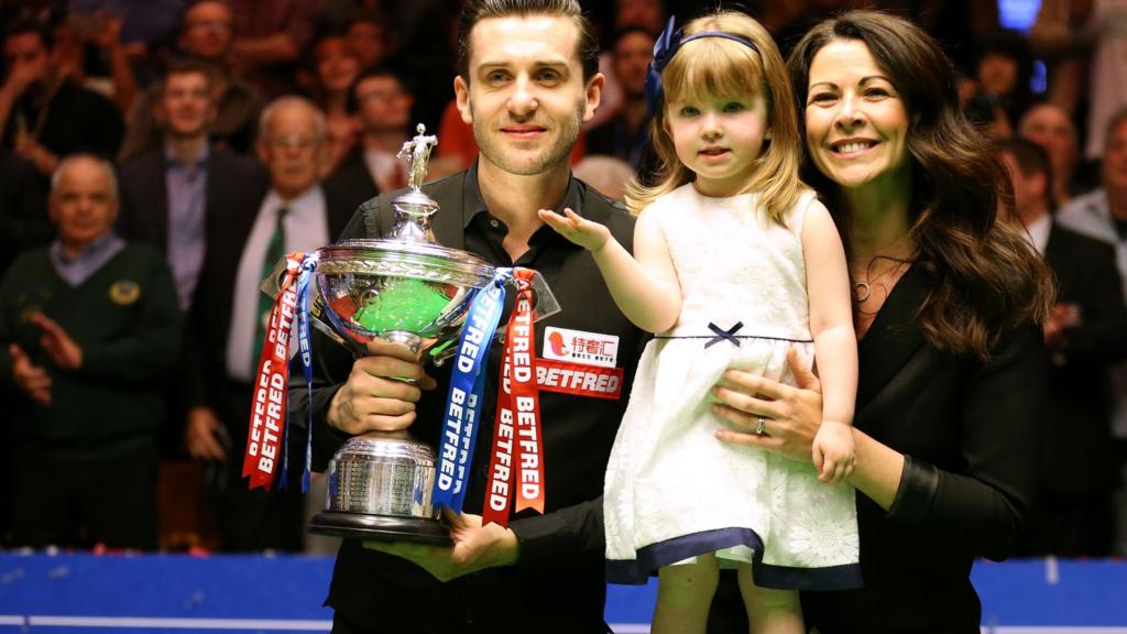 Mark Selby celebrates